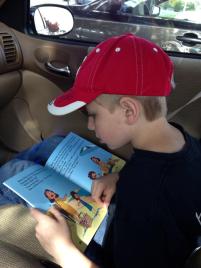 Alex reading Santa's Secret