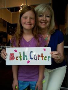 This little girl, Avery, has at least two of my books!