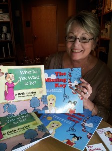Lisa Slavens, founder of Wish I May, is holding donated copies of my books for underprivileged children. Wish I May provides birthday parties complete with a cake and gifts for the children.