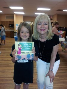 This precious little girl ran toward me, arms outstretched, and said, "I LOVE your books!" She made my month!